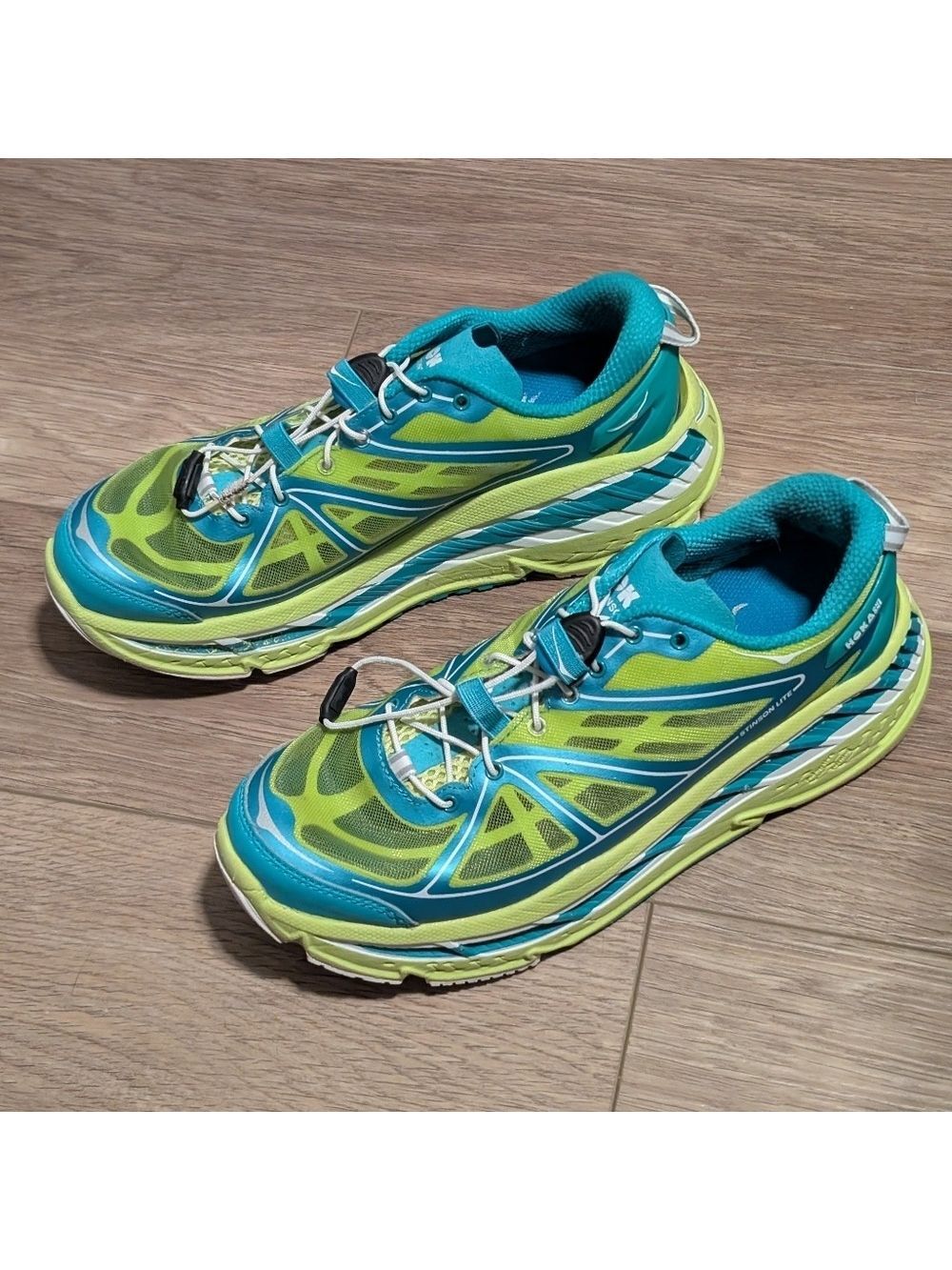 HOKA ONE ONE | Stinson Lite Running Shoes Max Cushion Green Teal Women’s US 10